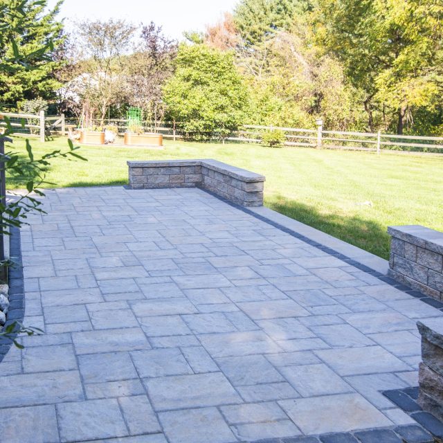 right side angle of hardscaped square patio