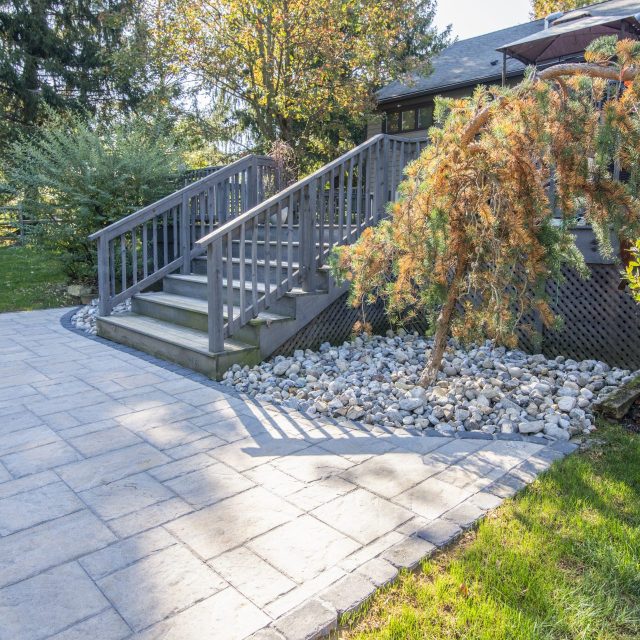 close up photo of stairs leading down to patio