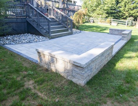 Detail shot of hardscaped patio and patio wall