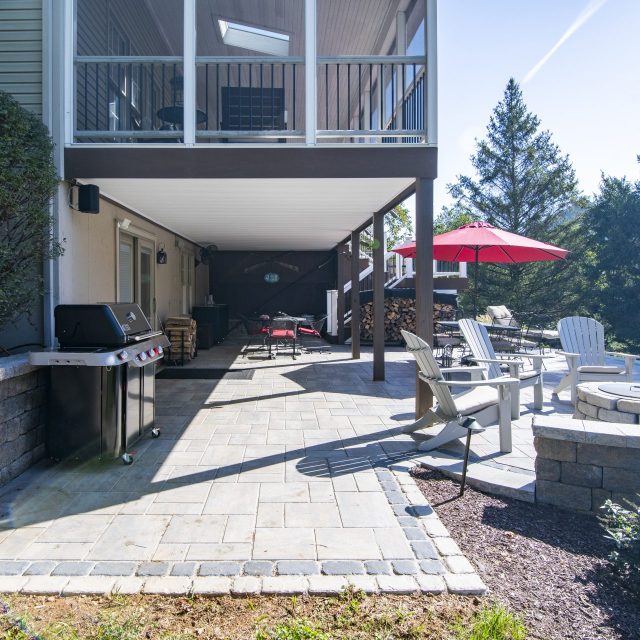 wide side angle of the grilling area and hardscaped fire pit