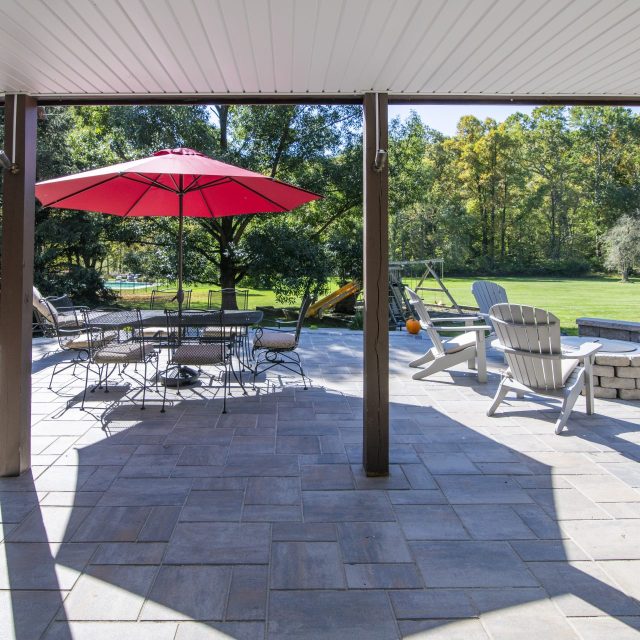photo from underneath deck onto back patio