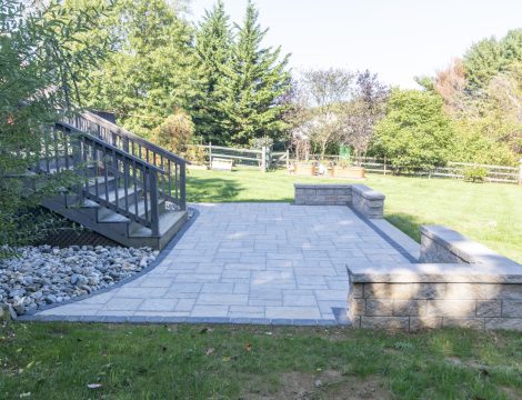 hardscaped patio with retaining wall